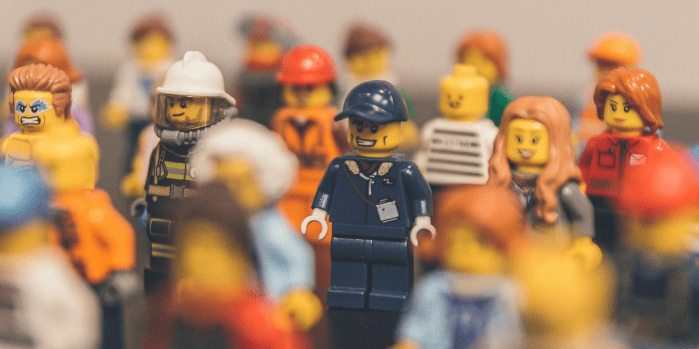A crowd of mini lego figurines to illustrate synthetic users